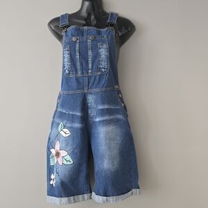 Denim Short Overalls with Floral Embroidery. Feminine, earthy, and DIY-inspired.